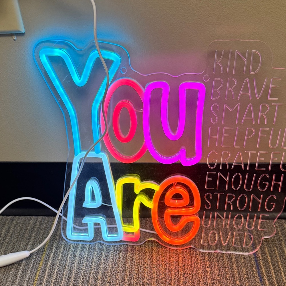 Colorful Neon 'You Are' Sign